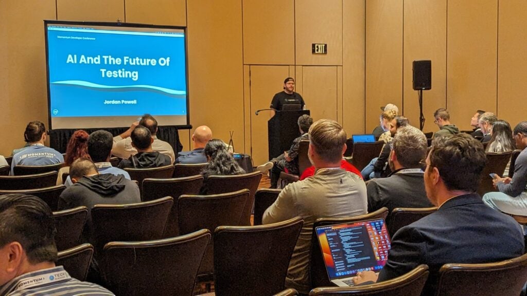 Speaker Jordan Powell talks about AI and testing at the Momentum Developer Conference 2023